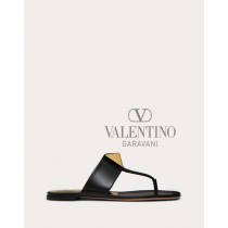 Shop fake valentino yorkdale toronto One Stud Calfskin Flat Thong Sandal for Woman in Black