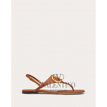 Buy knockoff valentino canada online Vlogo Signature Flat Thong Sandal In Grainy Calfskin for Woman in Saddle Brown